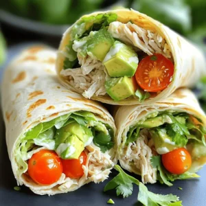 To make savory Chicken Avocado Ranch Burritos, gather these ingredients: - 2 cups cooked shredded chicken - 1 ripe avocado, diced into small chunks - 1/2 cup creamy ranch dressing - 1 cup cherry tomatoes, halved for sweetness - 1 cup crisp shredded lettuce - 1 cup shredded sharp cheddar cheese - 4 large flour tortillas, preferably burrito-sized - 1 tablespoon freshly squeezed lime juice - 1/2 teaspoon garlic powder for flavor - Salt and freshly cracked black pepper to taste - Fresh cilantro leaves, for garnish (optional) You can swap the chicken with cooked beans for a vegetarian option. Use dairy-free ranch dressing if you want a dairy-free burrito. For this recipe, you need a few key tools: - Large mixing bowl - Non-stick skillet - Measuring cups and spoons - Sharp knife and cutting board Accurate measurements ensure your burritos taste great. A little extra or less can change the flavor and texture. Enjoying every bite is what makes this dish special! To start, you want to mix your chicken well. In a large bowl, combine the cooked, shredded chicken with ranch dressing, lime juice, garlic powder, salt, and black pepper. Stir until the chicken is fully coated. This helps every bite burst with flavor. For texture, use shredded chicken. This gives the burrito a great mouthfeel. If you want a creamier mix, add more ranch dressing. This will keep the chicken moist and delicious. Next, it’s time to fill the tortillas. Lay one tortilla flat on a clean counter. Spoon one-fourth of the chicken mixture into the center. Spread it evenly. This helps balance the flavors. Now, add diced avocado, halved cherry tomatoes, shredded lettuce, and cheddar cheese on top. Make sure to distribute these fillings evenly. Avoid overstuffing, or your burrito might burst! To roll the burrito, fold the sides of the tortilla in first. Then, roll it tightly from the bottom upwards. This keeps everything secure. Repeat this with the rest of the tortillas and filling. For that crispy texture, grill the burritos in a non-stick skillet. Heat it over medium heat. Cook each burrito for about 2-3 minutes on each side. Look for a golden brown color. This shows they are ready and delicious. To check for doneness, gently press on the burrito. If it feels firm and warm, it’s done! Slice each burrito in half diagonally. If you like, add fresh cilantro as a garnish. This adds a nice touch to your dish. To boost the flavor of your burritos, consider adding spices. A pinch of cumin or paprika can bring depth. Fresh herbs like cilantro or parsley add brightness. If you enjoy a kick, try adding some chili powder or diced jalapeños. For a creamier touch, drizzle on extra ranch dressing just before closing the burrito. This adds richness and moisture. Rolling burritos can be tricky. To keep your fillings from spilling out, use a tight fold. Start by folding the sides of the tortilla inward before rolling. This helps contain the filling. Make sure not to overfill your burrito. A good rule is to use about one-fourth of the filling per tortilla. If you want visual guides, check out video tutorials online. They can show you the best rolling techniques. {{image_4}} You can easily make these burritos fit different diets. For a vegetarian option, swap the chicken with black beans or grilled veggies. This will add protein and keep the dish hearty. If you want a vegan burrito, use a dairy-free ranch dressing and skip the cheese. You can also add avocado for creaminess. For those needing gluten-free options, look for gluten-free tortillas made from rice or corn. They work great and hold the fillings well. Just make sure they are big enough to wrap tightly around the fillings. To mix things up, try adding different proteins. Shrimp or beef can give your burrito a new flavor. Just cook them separately and season well before adding them to the mix. You can also use seasonal vegetables. Think about adding roasted corn, sautéed bell peppers, or even spinach. These not only add taste but also bring color and nutrition to your burrito. Don't be afraid to experiment! Each twist can create a new favorite. For the full recipe, feel free to check the details above. To keep leftover burritos fresh, wrap each one tightly in foil or plastic wrap. You can also use an airtight container. Store them in the refrigerator for up to three days. When you want to reheat, take them out and unwrap. Place them on a plate and cover with a damp paper towel. Heat in the microwave for about one to two minutes. This helps keep the tortilla soft. You can also use a skillet. Heat it on medium-low. Cook each side for two to three minutes until warm. To freeze burritos, let them cool completely first. Wrap each burrito tightly in foil or plastic wrap. Then place them in a freezer-safe bag. Remove as much air as possible. Label the bags with the date. Frozen burritos last up to three months. When you’re ready to eat, take a burrito out and let it thaw in the fridge overnight. You can also thaw it in the microwave for a few minutes. After thawing, heat it in the oven or skillet without wrapping. This gives a crispy texture back. Enjoy your meal anytime with this easy storage method! To make your Chicken Avocado Ranch Burritos healthier, consider these tips: - Use whole wheat tortillas instead of white. - Replace creamy ranch with a yogurt-based dressing. - Add more veggies like bell peppers or spinach. - Cut down on cheese or use a low-fat version. - Use grilled chicken instead of fried for less fat. These small changes can still keep your burritos tasty while lowering calories and fat content. Yes, you can! Meal prepping makes life easier. Here’s how: - Prepare the chicken mixture and store it in the fridge. - Assemble the burritos but do not grill them. Wrap each in foil. - Store the wrapped burritos in the fridge for up to 3 days. - For longer storage, freeze them for up to 3 months. - When ready to eat, thaw and grill the burritos for a fresh taste. This way, you have a quick meal ready anytime. Great sides can make your meal even better. Here are some ideas: - A light salad with mixed greens and a vinaigrette. - Fresh salsa with diced tomatoes, onions, and cilantro. - Guacamole for extra creaminess and flavor. - Corn on the cob, grilled or boiled, for sweetness. - A side of black beans for protein and fiber. These sides complement the flavors of the burritos well. Enjoy! This article helped you learn how to make Chicken Avocado Ranch Burritos. We covered ingredients, cooking tools, and clear instructions for preparation and assembly. Remember, using the right spices can boost flavor. Also, storing burritos well keeps them fresh. Experiment with variations to fit your taste, whether vegetarian or gluten-free. Enjoy making these delicious burritos!