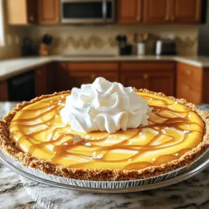 - 1 pre-made graham cracker pie crust - 1 cup pumpkin puree - 1 cup cream cheese, softened - 1/2 cup powdered sugar - 1 teaspoon pure vanilla extract - 1 teaspoon pumpkin pie spice - 1/2 cup heavy cream, chilled - 1/2 cup salted caramel sauce, plus extra for drizzling - A pinch of flaky sea salt - Whipped cream for topping - A sprinkle of cinnamon for garnish - A few chocolate shavings for decoration - A sprig of mint for color - Mixing bowls - Electric mixer or whisk - Spatula - Measuring cups and spoons - Plastic wrap or a pie lid - Serving plates Start by taking a medium bowl. Add the softened cream cheese and powdered sugar. Use an electric mixer to beat them together. Mix on medium speed until the mixture is smooth. Make sure there are no lumps in the blend. Next, carefully add the pumpkin puree to your cream cheese mix. Also, add the vanilla extract, pumpkin pie spice, and a pinch of flaky sea salt. Mix these on low speed until everything is well combined. The goal is a creamy and smooth mixture. In a separate bowl, pour in the chilled heavy cream. Use a hand mixer or a whisk to whip it. Beat until soft peaks form, which should take about 2 to 3 minutes. Be careful not to over-whip; you want it light and airy. Drizzle the salted caramel sauce into the pumpkin mixture. Use a spatula to gently fold it in. This creates beautiful swirls in the filling. Avoid fully combining it to keep that delightful marbled look. Take your pre-made graham cracker crust. Spoon the pumpkin filling into it. Use a spatula to smooth the top and make it even. This will make your pie look inviting. Cover your pie with plastic wrap or a lid. Place it in the fridge for at least 4 hours. For the best taste, chill it overnight. This helps the pie set and enhances the flavors. To get the best whipped cream, use very cold heavy cream. Start with a clean bowl and whisk. Beat on medium speed until soft peaks form. This should take about 2 to 3 minutes. Stop mixing when it feels light and fluffy. If you whip too much, it can turn grainy. Keep it soft and airy for a nice texture. When mixing your pumpkin filling, add the pumpkin puree and spices slowly. This helps blend them well. Use a spatula to fold the salted caramel into the pumpkin mix gently. You want to see swirls, not a full mix. This keeps the flavors distinct and fun in every bite. For a beautiful finish, serve slices on nice plates. Drizzle extra salted caramel over each slice. Add a generous dollop of whipped cream on top. Sprinkle a pinch of flaky sea salt for a gourmet touch. A sprig of mint also adds a pop of color and freshness. A well-presented pie makes every bite more enjoyable! {{image_4}} If you want to switch up the crust, try using a chocolate cookie crust. This adds a rich flavor. You can also use an almond flour crust for a gluten-free option. Just mix almond flour with melted butter and press it into a pie dish. Both options give a tasty twist to the pie. You can enhance the flavor with a splash of maple syrup. It adds a warm touch. Adding a bit of nutmeg or cloves gives the pie a deeper spice level. For a chocolatey delight, mix cocoa powder into the filling. Experimenting with flavors can make your pie unique and fun. For a lighter version, swap cream cheese for Greek yogurt. It keeps the texture creamy but cuts calories. If you need a vegan option, use coconut cream instead of heavy cream. You can also find dairy-free caramel sauces in stores. These swaps help everyone enjoy this pie. To store leftover pie, cover it tightly with plastic wrap or use a pie lid. This keeps the moisture in and the flavors fresh. Place it in the fridge. It will stay good for up to four days. If you want to enjoy it later, consider freezing. You can freeze the pie if you want to save it for later. Wrap the pie in plastic wrap and then in aluminum foil. This prevents freezer burn. It should keep well for about two months. When you are ready to eat it, thaw it in the fridge overnight before serving. - Pumpkin puree: Once opened, it lasts about a week in the fridge. - Cream cheese: Check the date on the package. Once opened, use it within two weeks. - Heavy cream: Use within a week or two after opening. - Powdered sugar: This lasts a long time. Keep it in a cool, dry place. - Salted caramel sauce: Store it in the fridge. It lasts for about two weeks. Keep these tips in mind to enjoy every last bite of your no-bake salted caramel pumpkin pie! Yes, you can make this pie ahead of time. It is best to chill it in the fridge for at least four hours. For better flavor, let it sit overnight. This allows the flavors to mix well. You can keep it covered to avoid any smells from the fridge. If you want a cream cheese substitute, try using mascarpone cheese. It has a similar texture and flavor. Another option is Greek yogurt. It will give a tangy taste but may be a bit thinner. Silken tofu can work too for a dairy-free choice. Blend it until smooth for the best texture. To make homemade salted caramel sauce, start with these items: - 1 cup granulated sugar - 6 tablespoons unsalted butter - 1/2 cup heavy cream - 1 teaspoon flaky sea salt 1. In a medium saucepan, heat the sugar over medium heat. Stir until it melts and turns amber. 2. Add the butter and stir until melted. 3. Slowly pour in the heavy cream while stirring. Be careful, as it will bubble. 4. Finally, add the salt and mix well. Let it cool before using. Yes, you can make this pie dairy-free. Use dairy-free cream cheese as a base. You can find brands made from nuts or soy. For the heavy cream, use coconut cream or almond milk. These will keep the pie creamy and delicious without dairy. This post covered how to make a delicious pie, from ingredients to tips. We explored the cream cheese mixture, the magic of pumpkin and spices, and the joy of salted caramel. You learned how to achieve perfect whipped cream and customize your pie. I hope you feel ready to create this treat. With some practice, you can share a wonderful dessert with family and friends. Enjoy every bite, and happy baking!