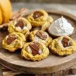 - 1 cup pumpkin puree - 1/2 cup coconut sugar - 1/4 cup maple syrup - 1/4 cup melted coconut oil - 1 teaspoon vanilla extract - 1 1/2 cups all-purpose or gluten-free flour - 1 teaspoon baking soda - 1 teaspoon ground cinnamon - 1/2 teaspoon ground nutmeg - 1/4 teaspoon ground ginger - 1/4 teaspoon salt - Optional: 1/2 cup chopped pecans or walnuts - Optional: 1/4 cup dairy-free chocolate chips These ingredients make a simple and tasty cookie. Pumpkin puree gives moisture and flavor. Coconut sugar adds sweetness with a hint of caramel. Maple syrup adds another layer of sweetness and natural flavor. Melted coconut oil keeps the cookies soft and adds richness. Vanilla extract enhances the overall taste, making it warm and inviting. The flour is the base, giving structure to the cookies. Baking soda helps the cookies rise and become fluffy. Ground cinnamon, nutmeg, and ginger give that classic pumpkin pie flavor. A pinch of salt balances the sweetness. You can add chopped pecans or walnuts for crunch. Dairy-free chocolate chips can add a sweet surprise in every bite. Using these ingredients, you can create delicious vegan pumpkin pie cookies. They are perfect for fall or any time you crave something sweet. 1. Preheat oven and prepare baking sheet Start by preheating your oven to 350°F (175°C). Line a baking sheet with parchment paper. This helps the cookies not stick. 2. Combine wet ingredients in a mixing bowl In a large mixing bowl, add 1 cup pumpkin puree, 1/2 cup coconut sugar, 1/4 cup maple syrup, 1/4 cup melted coconut oil, and 1 teaspoon vanilla extract. Mix these until smooth. 3. Whisk dry ingredients in a separate bowl In another bowl, whisk together 1 1/2 cups all-purpose flour, 1 teaspoon baking soda, 1 teaspoon ground cinnamon, 1/2 teaspoon ground nutmeg, 1/4 teaspoon ground ginger, and 1/4 teaspoon salt. Make sure they blend well. 4. Mix wet and dry ingredients together Gradually add the dry mix to the wet ingredients. Stir gently until just combined. If you want nuts or chocolate chips, fold them in now. 1. Scoop dough onto prepared baking sheet Using a tablespoon, scoop dough and place it on the baking sheet. Leave space between each scoop since they spread a bit. 2. Bake in preheated oven for specified time Bake the cookies for 12-15 minutes. Look for golden edges; the centers may seem soft, but they will harden as they cool. 3. Cool cookies after baking Let the cookies cool on the baking sheet for about 5 minutes. After that, move them to a wire rack to cool completely. To avoid overmixing, stir gently. When you mix the wet and dry ingredients, stop as soon as they blend. This keeps the cookies soft. Look for a thick dough that holds together but is not too smooth. Check your cookies for doneness by looking at the edges. They should be golden brown. The centers might feel soft. This is normal. They will firm up as they cool on the rack. For a great presentation, arrange the cookies on a festive plate. A sprinkle of cinnamon on top adds a nice touch. This looks lovely for holiday gatherings. Pair your cookies with coconut whipped cream. This creamy topping adds a nice flavor. You can also try other toppings like dairy-free chocolate sauce or chopped nuts for extra crunch. {{image_4}} You can easily adjust the recipe for common allergens. If you need a gluten-free option, swap all-purpose flour with a gluten-free blend. Look for blends made with almond, oat, or rice flour. These work well and keep the taste great. For sweeteners, you can replace coconut sugar and maple syrup with agave syrup. Agave is a lovely choice that adds sweetness and keeps it vegan. You can also use brown sugar if you prefer. Adding different spices can change the taste of your cookies. Try mixing in allspice or cloves for a warm flavor. You can also include a splash of almond or orange extract for a unique twist. Dried fruits or seeds can add texture and flavor. Consider adding raisins, cranberries, or sunflower seeds. These ingredients make the cookies fun and interesting. Just fold them into the dough before baking. To keep your vegan pumpkin pie cookies fresh, use an airtight container. This helps prevent air from making them dry. Place a piece of parchment paper between layers if you stack them. This keeps the cookies from sticking together. For longer storage, you can freeze the cookies. Place them in a freezer bag or container. Be sure to squeeze out as much air as possible. You can freeze them for up to three months. When you're ready to eat them, let them thaw at room temperature. These cookies stay fresh for about five days at room temperature. If you store them in the fridge, they can last up to a week. Watch for signs that the cookies have gone bad. If they smell off or have a strange texture, it’s best to toss them. A good cookie should still feel soft and look inviting. Enjoy them while they are fresh! Can I use fresh pumpkin instead of canned? Yes, you can use fresh pumpkin. Just roast and puree it. Fresh pumpkin adds a nice flavor. What can I substitute for coconut oil? You can use vegetable oil or vegan butter. Both will work well in this recipe. How do I know when the cookies are fully baked? Look for golden edges. The centers may be soft but will set as they cool. Can I make the dough ahead of time? Yes, you can chill the dough. Store it in the fridge for up to two days. These vegan pumpkin pie cookies are easy and fun to make. I shared the essential ingredients and step-by-step instructions to help you bake them perfectly. You learned tips for storing and serving these treats, plus variations to suit your tastes. In closing, these cookies are a great way to enjoy fall flavors. Try different ingredients or share them at your next gathering. Enjoy the delicious and cozy vibes they bring!