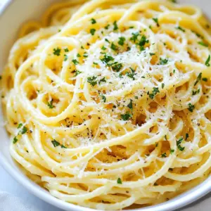 - 8 oz (225g) spaghetti or linguine - 4 tablespoons unsalted butter - 4 cloves garlic, minced - 3 cups vegetable broth (or chicken broth for added flavor) - 1 cup heavy cream - 1 cup grated Parmesan cheese - 1 teaspoon dried Italian herbs (oregano, basil, thyme) - Salt and pepper to taste - Fresh parsley, chopped (for garnish) - Lemon zest (optional, for brightness) When making One-Skillet Garlic Parmesan Pasta, I love using spaghetti or linguine. These pasta types soak up the sauce well. The butter and garlic create a rich base, while the broth adds depth. Heavy cream and Parmesan make the dish creamy and cheesy. Dried herbs give it that Italian touch. - Extra Parmesan for topping - Red pepper flakes for a kick - Sun-dried tomatoes for sweetness - Fresh basil for added freshness These extras can change the dish's flavor. Adding red pepper flakes gives it heat. Sun-dried tomatoes add a lovely sweetness. Fresh basil brightens the dish up. Feel free to mix and match! - Large skillet - Wooden spoon or spatula - Measuring cups and spoons - Knife and cutting board - Serving bowls Having the right tools makes cooking easier. A large skillet helps cook everything in one pot. A wooden spoon is great for stirring without scratching your skillet. Use a knife for chopping garlic and parsley. Make sure to have your measuring cups handy for accuracy! {{ingredient_image_1}} Gather your ingredients first. You will need: - 8 oz (225g) spaghetti or linguine - 4 tablespoons unsalted butter - 4 cloves garlic, minced - 3 cups vegetable or chicken broth - 1 cup heavy cream - 1 cup grated Parmesan cheese - 1 teaspoon dried Italian herbs - Salt and pepper to taste - Fresh parsley for garnish - Lemon zest (optional) Make sure you have a large skillet ready. This will help you cook everything in one pot. Start by melting the butter in your skillet over medium heat. When it melts, add your minced garlic. Saut&eacute; it for 1-2 minutes. Be careful not to let it brown; you want it fragrant. Next, pour in the broth and let it simmer gently. Add your uncooked spaghetti to the skillet. Press it down into the broth so it's covered. Stir occasionally while it cooks for 10-12 minutes. Check the pasta for doneness; it should be al dente. Most of the broth will absorb during this time. Now, turn the heat down to low. Stir in the heavy cream and grated Parmesan cheese. Mix until it becomes smooth and creamy. Next, add the dried Italian herbs and season with salt and pepper. If you like, add some lemon zest for extra flavor. Remove the skillet from the heat. Let the pasta sit for a couple of minutes. This will help it thicken up nicely. To serve, dish the pasta into deep bowls. Top with extra Parmesan cheese and a sprinkle of fresh parsley. A lemon wedge on the side can brighten up the dish even more. Enjoy your creamy delight! To get a creamy sauce, use heavy cream. This gives the sauce a rich texture. Stir the cream in slowly after cooking the pasta. It helps the sauce combine well. Grate fresh Parmesan cheese for the best flavor. Add it in small amounts, mixing well each time. If you want extra brightness, add lemon zest at the end. One common mistake is cooking the garlic too long. It can turn bitter and ruin the dish. Also, avoid using too much broth. Too much liquid makes the pasta watery. Make sure the pasta is fully submerged in the broth. Stir it occasionally to prevent sticking. Lastly, don&rsquo;t skip the seasoning. Salt and pepper are key for flavor. Serve this pasta with a fresh salad. A simple green salad with lemon vinaigrette works well. You can also add grilled chicken or shrimp for protein. These pair nicely with the creamy sauce. For extra flavor, top with more Parmesan and fresh parsley. A slice of lemon on the side brightens the dish even more. Pro Tips Use Fresh Garlic: Freshly minced garlic provides a much stronger and more vibrant flavor than pre-minced or powdered garlic. Adjust Consistency: If the sauce is too thick, add a splash of pasta water to loosen it up. This will also help the sauce adhere better to the pasta. Experiment with Cheese: While Parmesan is traditional, try mixing in other cheeses like Pecorino Romano or a bit of mozzarella for added creaminess. Garnish Smartly: Fresh herbs not only enhance the flavor but also add a pop of color. Consider basil or chives in addition to parsley. {{image_2}} You can easily add protein to this dish. Chicken is a great choice. Cook diced chicken in the skillet before adding garlic. For shrimp, just toss them in with the pasta. They cook fast and add a nice touch. If you want to keep it light, use vegetables. Zucchini, broccoli, or spinach work well. Just saut&eacute; them with the garlic for extra flavor. While spaghetti or linguine are classic choices, you can switch it up. Try penne or farfalle for fun shapes. Gluten-free pasta is also an option if needed. Just make sure to adjust cooking time. The key is to ensure the pasta cooks evenly and absorbs the creamy sauce. Want to spice things up? Add red pepper flakes for heat. Just a pinch can make a big difference. For a more herbal taste, use fresh herbs. Basil or thyme can bring a fresh flavor. You can even add sun-dried tomatoes for an extra punch. Experiment with flavors to find your favorite mix! To keep your One-Skillet Garlic Parmesan Pasta fresh, store it in an airtight container. Let it cool for about 30 minutes before sealing. This helps prevent condensation and sogginess. Place the container in the fridge. Your pasta will stay good for up to three days. When you are ready to eat your leftovers, reheat them gently. Use a skillet over low heat to warm the pasta. Add a splash of broth or cream to help it regain its creamy texture. Stir often to avoid burning. You can also microwave it in short intervals, stirring in between. This will help it heat evenly. If you want to save the pasta for later, freezing is a great option. Divide the pasta into portions, and use freezer-safe bags or containers. Be sure to squeeze out the air before sealing. It will stay fresh for up to three months. To thaw, place it in the fridge overnight before reheating. This helps keep the flavor and texture intact. Yes, you can use gluten-free pasta. Just check the cooking time. Gluten-free pasta often cooks faster. Keep an eye on it as you stir. You can use half-and-half or whole milk. For a lighter option, try cashew cream. Each will change the texture a bit but still taste great. The dish lasts about three days in the fridge. Store it in an airtight container. When you reheat, add a splash of broth to keep it creamy. Yes, you can prep this dish in advance. Cook the pasta and let it cool. Store it in the fridge. Add sauce and heat when ready to serve. This pasta pairs well with salad or garlic bread. You could also serve it with grilled chicken or shrimp for more protein. A light white wine can enhance the meal too. You explored key elements of making a delicious One-Skillet Garlic Parmesan Pasta. We covered the main ingredients, cooking steps, and helpful tips for the best creamy sauce. Remember to customize it with proteins or different pasta types for variety. Proper storage can keep your dish fresh, and reheating is easy. Use our FAQs for quick answers. Enjoy cooking and savoring this dish, knowing you can make it just right!