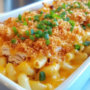 - 8 oz elbow macaroni - 2 cups shredded cooked chicken - 1 cup honey-flavored BBQ sauce This dish starts with elbow macaroni. It gives you that perfect base. Next, you need shredded cooked chicken. You can use leftover chicken or rotisserie chicken. Finally, grab some honey-flavored BBQ sauce. This sauce is key for that sweet and smoky flavor. - 2 cups sharp cheddar cheese, shredded - 1 cup mozzarella cheese, shredded - 1/2 cup cream cheese, softened Now, let's talk cheese. Sharp cheddar cheese adds a nice bite. Use two cups for a rich taste. Next, add one cup of mozzarella cheese. It brings a creamy texture. Lastly, cream cheese makes the sauce smooth. You only need half a cup, but it changes everything. - 1 tsp garlic powder - 1 tsp onion powder - 1/2 cup panko breadcrumbs Seasoning is the secret to great flavor. Use one teaspoon of garlic powder for depth. Add one teaspoon of onion powder for sweetness. Finally, panko breadcrumbs give a crunchy topping. You&rsquo;ll mix these with olive oil before baking. It adds texture and makes the dish even better. {{ingredient_image_1}} To start, fill a large pot with water and add a good amount of salt. Bring the water to a boil. Once boiling, add the elbow macaroni. Cook it according to the package instructions until it is al dente. This usually takes around 7-9 minutes. After cooking, drain the pasta and set it aside. You want it firm, not mushy. Next, grab a medium saucepan and set it over medium heat. Add the softened cream cheese and milk. Stir the mixture until the cream cheese melts and becomes smooth. This is the base of our cheese sauce. Now, it&rsquo;s time to add the fun part&mdash;cheese! Stir in the sharp cheddar and mozzarella cheese. Mix them in until they are fully melted and creamy. Season the cheese sauce with garlic powder, onion powder, smoked paprika, salt, and pepper. Taste it and adjust if needed. In a large bowl, mix the shredded chicken with the honey-flavored BBQ sauce. Make sure every piece is well coated. Now, add the cooked macaroni to the bowl with the chicken. Pour in the creamy cheese sauce next. Gently stir everything together until you see a nice blend of chicken, pasta, and sauce. Now, let&rsquo;s prepare for baking. Preheat your oven to 350&deg;F (175&deg;C). Take a baking dish and transfer the mac and cheese mixture into it. To add a crunchy topping, mix panko breadcrumbs with olive oil in a small bowl. Sprinkle this mixture evenly over the mac and cheese. Finally, place the baking dish in the oven and bake for 25-30 minutes. You want the top to be golden and crispy. Enjoy the wonderful smell while it bakes! To get the best cheese sauce, you need the right texture. If your sauce is too thick, add a bit more milk. If it&rsquo;s too thin, let it cook a bit longer. You want a creamy sauce that clings to the pasta. If you run out of cream cheese, you can use sour cream. It gives a nice tang. For a lighter option, try Greek yogurt instead. Both choices will still make your sauce creamy and rich. To kick up the flavor, add spices. Try smoked paprika for a deeper taste. You can also mix in some cayenne for heat. Fresh herbs like parsley can give a nice touch too. When choosing between garlic and onion powder, think about your taste. Garlic powder adds a strong taste. Onion powder is milder and sweeter. You can even combine both for a great balance. This dish pairs well with simple sides. A fresh green salad gives a nice crunch. You might also like garlic bread for extra flavor. For presentation, use a nice baking dish. Once it&rsquo;s baked, let it cool before serving. Top with chopped green onions for color. This makes your dish look extra special and inviting. Pro Tips Use Leftover Chicken: This recipe is a fantastic way to use up leftover rotisserie chicken, saving both time and effort. Customize Your BBQ Sauce: Feel free to experiment with different BBQ sauces for varied flavor profiles; a spicy or smoky BBQ sauce can add a nice kick. Make it Creamier: For an extra creamy texture, add more cream cheese or a splash of heavy cream to your cheese sauce. Breadcrumb Alternatives: If you don&rsquo;t have panko breadcrumbs, regular breadcrumbs can be used, but consider toasting them slightly for added crunch. {{image_2}} You can switch up the meat in this dish. Pulled pork adds a nice twist. It gives a smoky flavor that blends well with BBQ sauce. You can also use shredded beef. This works great for a heartier meal. If you want a meatless option, try using jackfruit. It has a similar texture to pulled meat. You can season it with BBQ sauce for a tasty vegetarian dish. While sharp cheddar and mozzarella are classic choices, there are many other cheeses to try. Gouda adds a rich, smoky taste. Pepper jack gives a spicy kick. Feel free to mix and match your favorite cheeses. If you need a vegan option, look for vegan cream cheese and cheese shreds. Nutritional yeast also adds a cheesy flavor without dairy. The BBQ sauce you choose can change the whole dish. A spicy BBQ sauce can add heat and depth. Look for sauces labeled as spicy or hot. If you want to make your own, combine ketchup, apple cider vinegar, and brown sugar. Add spices like chili powder or cayenne for extra flavor. Homemade BBQ sauce lets you control the heat and sweetness. Store any leftover Honey BBQ Chicken Mac and Cheese in an airtight container. This keeps it fresh and tasty. I recommend using glass or plastic containers with tight-fitting lids. Make sure to let it cool before sealing. This helps prevent moisture buildup. Leftovers should be eaten within three to four days for the best quality. To freeze mac and cheese, let it cool completely first. Then, place it in a freezer-safe container. You can also use heavy-duty freezer bags. Squeeze out as much air as possible to avoid freezer burn. It will stay good for up to three months. When you're ready to eat, thaw it in the fridge overnight. You can reheat your mac and cheese in two ways: the microwave or the oven. For the microwave, place it in a bowl and add a splash of milk. This keeps it creamy. Heat it for about two minutes, stirring halfway through. For the oven, preheat it to 350&deg;F (175&deg;C). Place the mac and cheese in an oven-safe dish. Cover it with foil to lock in moisture. Bake for 15 to 20 minutes. This method helps maintain texture and flavor, making it taste fresh again. Yes, you can make Honey BBQ Chicken Mac and Cheese ahead of time. Prepare the dish up to the baking step. Place it in the baking dish and cover it tightly with plastic wrap or aluminum foil. Store it in the fridge for up to two days. When ready to bake, remove the cover and bake it straight from the fridge. You may need to add extra baking time if it's cold. This method keeps the flavors fresh and saves you time. To add heat to your Honey BBQ Chicken Mac and Cheese, try these tips: - Mix in a teaspoon of cayenne pepper or red pepper flakes. - Use a spicy BBQ sauce instead of honey-flavored sauce. - Add diced jalape&ntilde;os or a splash of hot sauce when mixing the chicken and BBQ. - Consider topping it with a sprinkle of chili powder before baking for an extra kick. These options let you control the spice level to fit your taste. Honey BBQ Chicken Mac and Cheese pairs well with several side dishes. Here are a few ideas: - Coleslaw: Adds a crunchy, refreshing contrast. - Garlic Bread: Perfect for soaking up cheesy goodness. - Steamed Vegetables: Broccoli or green beans add color and nutrients. - Corn on the Cob: Sweet corn complements the BBQ flavors nicely. These sides enhance the meal and make it more satisfying. This blog shares how to make Honey BBQ Chicken Mac and Cheese. You learned about key ingredients, from elbow macaroni to the perfect cheese mix. We covered simple cooking steps, tips to improve flavor, and tasty variations. Finally, you can store this dish for later and still enjoy its great taste. Whether you share it or savor it alone, this recipe offers warmth and comfort. Dive in and enjoy your flavorful creation!