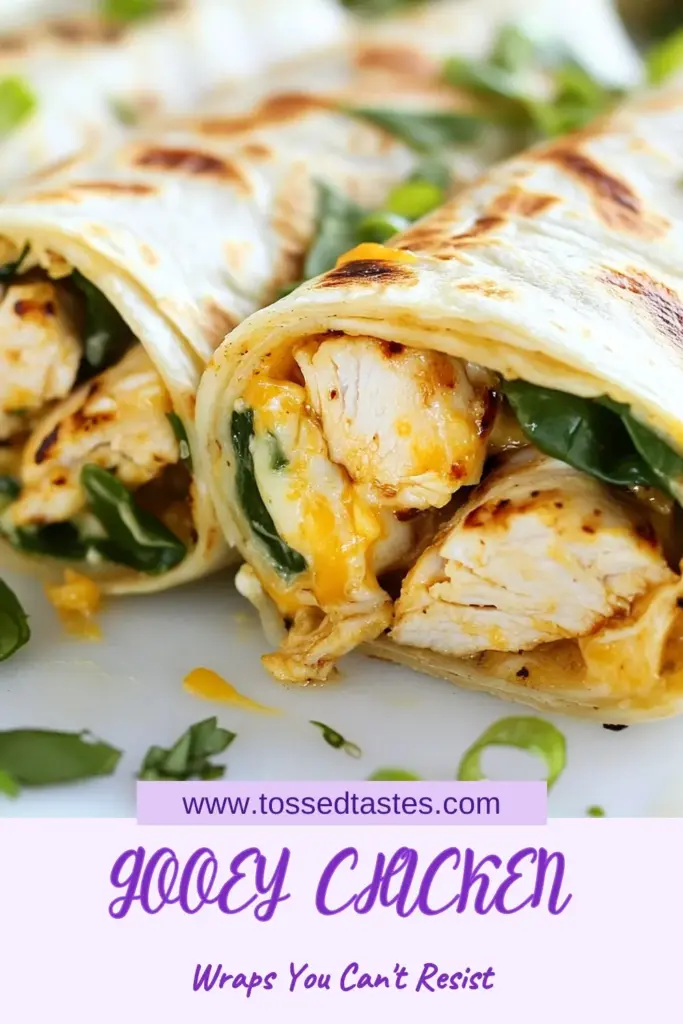 Discover the deliciousness of Gooey Garlic Chicken Wraps! This easy chicken wrap recipe features tender chicken mixed with creamy cheeses and zesty garlic, all wrapped up in large flour tortillas. Perfect for a quick meal, these cream cheese chicken wraps will soon become your favorite. Spice it up with Sriracha for a kick in these spicy garlic chicken wraps. Try this flavorful Chicken Tortilla Wrap today! Save this for later! #ChickenWrapRecipe #EasyChickenWraps #GooeyGarlicChickenWraps #SpicyGarlicChickenWraps