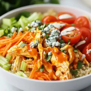 - Chicken - 2 boneless, skinless chicken breasts - Sauces - 1 cup buffalo sauce (store-bought or homemade) - &frac12; cup ranch or blue cheese dressing - Vegetables - 1 cup chopped celery - 1 cup shredded carrots - 1 cup cherry tomatoes, halved - Grains - 1 cup cooked quinoa - Dairy and Garnishes - &frac12; cup blue cheese crumbles (or feta as an alternative) - Fresh parsley, chopped (for garnish) When making Buffalo Chicken Bowls, I always start with these key ingredients. The chicken is the heart of the dish. I love using boneless, skinless chicken breasts for easy cooking and shredding. Buffalo sauce adds that spicy kick we crave. You can buy it or make your own for a special touch. For a creamy finish, ranch or blue cheese dressing pairs perfectly with our spicy chicken. Next, we add freshness with vegetables. I use celery for crunch, carrots for sweetness, and cherry tomatoes for juiciness. The colorful mix is not just pretty; it packs in nutrition. Quinoa serves as a hearty base. It&rsquo;s rich in protein and keeps you full. Lastly, I sprinkle blue cheese on top. It adds a tangy flavor that balances the heat. Fresh parsley gives a nice pop of color and freshness. With these ingredients, you&rsquo;ll create a bowl that is packed with flavor and nutrition. Enjoy the process of putting it all together! {{ingredient_image_1}} 1. Preheating the oven: Start by setting your oven to 375&deg;F (190&deg;C). This ensures your chicken cooks evenly and becomes tender. 2. Seasoning the chicken: Pat the chicken breasts dry with a paper towel. Sprinkle garlic powder, onion powder, salt, and pepper on both sides. This adds flavor to your chicken. 3. Searing the chicken: Heat olive oil in a skillet over medium heat. Once hot, add the chicken breasts. Sear each side for about 3-4 minutes until golden brown. This step gives the chicken a nice crust. 1. Transferring to baking dish: Carefully move the seared chicken to a baking dish. Make sure it is not crowded to cook evenly. 2. Coating with buffalo sauce: Pour the buffalo sauce over the chicken. Ensure each piece is well-coated for maximum flavor. 3. Baking times and temperature: Place the dish in your preheated oven. Bake for 20-25 minutes. The chicken is done when it reaches an internal temperature of 165&deg;F (75&deg;C). 1. Allowing chicken to rest: Once cooked, remove the chicken from the oven. Let it rest for a few minutes. This helps keep the juices in. 2. Techniques for shredding: Use two forks to shred the chicken into bite-sized pieces. Mix it with the buffalo sauce from the dish. This step makes the chicken extra tasty. 3. Layering the bowls with ingredients: In a serving bowl, start with cooked quinoa as your base. Then, add the shredded buffalo chicken. Top with chopped celery, shredded carrots, and halved cherry tomatoes for a colorful presentation. By following these steps, you&rsquo;ll create a delicious and hearty buffalo chicken bowl that is both packed with flavor and nutrition. Enjoy your cooking! To make great buffalo chicken, you need the right temperature. Cook the chicken until it reaches 165&deg;F (75&deg;C). Use a meat thermometer for accuracy. This step keeps the chicken safe to eat and moist. To avoid dryness, don&rsquo;t overcook the chicken. Searing it first adds flavor and locks in moisture. Always let it rest after baking. This lets the juices settle, making the chicken tender and juicy. Layering your ingredients helps create a great buffalo chicken bowl. Start with a base of cooked quinoa. It adds protein and fiber. Next, pile on the shredded buffalo chicken. Don&rsquo;t forget the veggies! Add chopped celery, shredded carrots, and halved cherry tomatoes. These give your bowl crunch and freshness. If you prep your ingredients in advance, it will save time. Chop your veggies and cook your grains early in the day. Choosing the right dressing makes a big difference. I love ranch or blue cheese dressing for this bowl. They add a creamy touch that pairs well with spicy buffalo chicken. If you want a twist, try using feta cheese instead of blue cheese. It gives a nice tang. You can even skip the creamy dressings and use a vinaigrette. The choice is yours! Pro Tips Use a Meat Thermometer: Ensure your chicken reaches an internal temperature of 165&deg;F (75&deg;C) for safe consumption. Let the Chicken Rest: Allowing the chicken to rest for a few minutes before shredding helps retain its juices and flavor. Customize Your Toppings: Feel free to add other veggies or toppings like avocado or jalape&ntilde;os for extra flavor and texture. Make it Ahead: Prepare the chicken and quinoa in advance for a quick assembly during busy weeknights. {{image_2}} You can switch proteins in your Buffalo chicken bowls. Turkey works great if you want a leaner option. Tofu is a fun choice for a plant-based meal. Next, try different grains. Quinoa is my go-to for its nutrition. But rice or couscous can make a tasty base too. Each grain brings its own flavor and texture. To kick up the heat, add jalape&ntilde;os to your bowl. They bring a nice punch and pair well with buffalo sauce. If you prefer milder flavors, try fresh herbs like cilantro or basil. For toppings, avocado is creamy and delicious. You can also add crunchy radishes or even pickled onions for extra zest. Each topping adds a new layer of flavor. If you follow a low-carb diet, skip the grains. Use leafy greens like spinach or kale instead. They add nutrients and keep your meal light. For vegan options, replace chicken with jackfruit or chickpeas. Use a vegan buffalo sauce and skip the cheese. You can still enjoy full flavors without animal products. To keep your buffalo chicken bowls fresh, store them in an airtight container. Make sure the bowls cool down first before sealing. Refrigerate them right away. They stay good for up to four days. If you see any signs of spoilage, throw them out. Safety first! When you want to enjoy leftovers, you have a few options. The oven is the best choice. Preheat it to 350&deg;F (175&deg;C). Place the bowl in the oven for about 10-15 minutes. This keeps the chicken juicy. If you use the microwave, heat it in short bursts. Stir every minute to avoid hot spots and drying out the chicken. To freeze your buffalo chicken bowls, start by letting them cool completely. Use freezer-safe containers or bags. Remove as much air as possible to prevent freezer burn. They can last up to three months in the freezer. When ready to eat, thaw them in the fridge overnight. Then reheat them as mentioned before for best results. To make buffalo chicken bowls from scratch, start with the chicken. You can use boneless chicken breasts. Season them with garlic powder, onion powder, salt, and pepper. Then, sear the chicken in olive oil until golden. For the sauce, you can use store-bought buffalo sauce or make your own. If you want to make homemade sauce, mix hot sauce with melted butter. This gives a rich, creamy flavor. After cooking the chicken, shred it and mix it with the sauce. Next, layer your base of cooked quinoa. Top it with the shredded chicken and your favorite veggies. Add blue cheese crumbles and drizzle ranch dressing on top. Yes, you can make buffalo chicken bowls ahead of time. It&rsquo;s a great meal prep option. Cook the chicken and quinoa in advance. Store each in separate containers. You can keep them in the fridge for up to four days. When you&rsquo;re ready to eat, just reheat the chicken and quinoa. Assemble the bowls with fresh veggies and toppings right before serving. This keeps everything crisp and tasty. Buffalo chicken bowls are versatile! You can serve them with many side dishes. Here are some great ideas: - Fresh fruit salad: It adds sweetness and balances the spicy flavors. - Corn on the cob: Sweet and buttery corn complements the heat of the buffalo sauce. - Sweet potato fries: Crispy and savory, they pair well with the meal. - Garden salad: A light salad adds crunch and freshness. - Roasted vegetables: Carrots, zucchini, or bell peppers can add extra nutrition. Feel free to mix and match these sides to create a well-rounded meal! In this blog post, we covered all you need for buffalo chicken bowls. We discussed the key ingredients, step-by-step cooking instructions, and handy tips to make your meal great. Don't forget the many variations you can try for different tastes and diets. Lastly, we shared the best storage and reheating methods to keep your bowls fresh. Make this dish your own, and enjoy every bite!