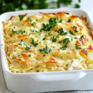 To make this French Onion Chicken Orzo Casserole, gather these simple ingredients: - 2 cups cooked orzo pasta - 2 tablespoons olive oil - 1 large onion, thinly sliced - 3 garlic cloves, minced - 2 cups cooked chicken, shredded - 4 cups chicken broth - 1 teaspoon dried thyme - 1 teaspoon dried rosemary - 1 cup shredded Gruyere cheese - 1 cup shredded mozzarella cheese - 1 tablespoon soy sauce - Salt and pepper to taste - &frac14; cup fresh parsley, chopped (for garnish) You can swap some ingredients if needed: - Use any pasta you have instead of orzo. - If you do not have Gruyere, try Swiss cheese. - Chicken can be replaced with turkey or rotisserie chicken. - For a vegan option, use plant-based chicken and cheese. - Swap chicken broth for vegetable broth for a lighter flavor. Make sure you have these tools ready: - A large skillet for cooking onions. - A mixing bowl for combining the ingredients. - A 9x13-inch baking dish to hold the casserole. - A sharp knife for slicing the onion. - A wooden spoon for mixing and stirring. - An oven mitt for safely handling hot dishes. These ingredients and tools will help you create a delightful meal. {{ingredient_image_1}} Start by gathering all your ingredients. You will need cooked orzo pasta, olive oil, sliced onion, minced garlic, shredded chicken, chicken broth, dried thyme, dried rosemary, Gruyere cheese, mozzarella cheese, soy sauce, salt, and pepper. Don't forget fresh parsley for garnish! Next, preheat your oven to 375&deg;F (190&deg;C). This step is important. It ensures your casserole bakes evenly and becomes bubbly. Now, heat the olive oil in a large skillet on medium heat. Add the sliced onion and cook for 15-20 minutes. Stir occasionally. You want the onions to become soft and golden brown. This caramelization adds deep flavor. After that, add the minced garlic and cook for another 2-3 minutes. The smell will be amazing! In a large bowl, combine the cooked orzo, shredded chicken, and the caramelized onions and garlic. Pour in the chicken broth and add the dried thyme and rosemary. Add soy sauce, salt, and pepper to taste. Mix everything well. This blend creates a rich and savory base for your casserole. Transfer this mixture into a greased 9x13-inch baking dish. Make sure to spread it out evenly. Now, sprinkle the shredded Gruyere and mozzarella cheeses over the top. This cheese blend will create a delightful, gooey layer. Place the baking dish in the preheated oven. Bake for 25-30 minutes. You want the cheese to melt and get golden brown. When it&rsquo;s done, take it out and allow it to cool for a few minutes. Finally, garnish with chopped fresh parsley before serving. This adds a pop of color and fresh flavor. Enjoy your delicious French onion chicken orzo casserole! To caramelize onions, start with a large skillet. Heat olive oil over medium heat. Add your sliced onions to the skillet. Stir them every few minutes. This helps them cook evenly. You want them soft and golden brown. This takes about 15 to 20 minutes. For extra flavor, add minced garlic near the end. Cook the garlic for only 2 to 3 minutes. This brings out its best taste without burning it. Use cooked chicken for this casserole. You can use rotisserie chicken for ease. It adds great flavor and saves time. Shredded chicken works best here. If you want, you can also cook your chicken. Boil or bake it until fully done. Let it cool before shredding. This way, it mixes well with the orzo and sauce. For the best cheese, use Gruyere and mozzarella. Gruyere adds a rich and nutty taste. Mozzarella gives a great stretchy melt. Mix them together for a perfect topping. Sprinkle them evenly over the casserole. Bake until bubbly and golden. If you want more flavor, try adding Parmesan. This will give your dish an extra kick. Pro Tips Caramelizing Onions: Be patient while caramelizing the onions; low and slow is key to achieving that deep, sweet flavor. Cheese Choices: You can substitute Gruyere with other cheeses like fontina or gouda for a different flavor profile. Broth Variations: Use homemade chicken broth for richer flavor, or substitute with vegetable broth for a lighter version. Garnish with Freshness: Adding fresh herbs like thyme or chives as a garnish can elevate the dish's flavor and presentation. {{image_2}} You can make this dish vegetarian by swapping chicken for mushrooms or chickpeas. Use vegetable broth instead of chicken broth for a rich flavor. Add more vegetables like spinach or bell peppers for extra nutrients and color. This option keeps the creamy texture and savory taste. If you don&rsquo;t have orzo, try using other small pasta shapes. Mini shells or bow ties work well. Just ensure you cook the pasta until al dente. This helps it hold up during baking. You can even use rice if you want a gluten-free option. Adjust cooking time based on the type of pasta you choose. Boost the flavor with more herbs like basil or oregano. A splash of white wine adds depth to the dish. You can also include sun-dried tomatoes for a tangy twist. Consider adding cooked bacon for a smoky flavor. Mixing in some peas or corn brings a sweet touch. These small changes can make a big difference in taste. To keep your French Onion Chicken Orzo Casserole fresh, place it in an airtight container. Make sure it cools down first. Store the leftovers in the fridge for up to three days. If you want to keep it longer, consider freezing it. When you are ready to enjoy the leftovers, preheat your oven to 350&deg;F (175&deg;C). Place the casserole in an oven-safe dish. Cover it with foil to keep it moist. Heat for about 20-25 minutes. You can also use a microwave. Heat it in a microwave-safe dish for 2-3 minutes, stirring halfway through. To freeze, let the casserole cool completely. Cut it into portions for easy reheating later. Wrap each piece well in plastic wrap, then place them in a freezer-safe bag. This way, it stays fresh for up to three months. Thaw overnight in the fridge before reheating. Yes, you can make this casserole ahead of time. Simply prepare it up to the baking step. Cover the dish with foil and store it in the fridge for up to 24 hours. When you're ready to bake, just remove the cover and add a few extra minutes to the baking time. This makes dinner planning easy! This casserole is great on its own, but some sides can make it even better. You could serve a fresh green salad for crunch. A side of garlic bread is also nice to soak up the sauce. For a healthy twist, try steamed veggies like broccoli or green beans. Yes, you can use other pasta types if you like. Small shapes like ditalini or elbow macaroni work well. Just be sure to cook the pasta al dente since it will bake in the casserole. This way, it won&rsquo;t get too soft while cooking. This post covered how to make a tasty French Onion Chicken Orzo Casserole. We explored key ingredients, substitutions, and needed tools. I walked you through the steps of preparation, cooking, and baking. Tips for caramelizing onions and choosing chicken added extra value. You learned about vegetarian options and how to store leftovers. In the end, this dish is simple and fun to make. I hope you feel ready to try it yourself! Enjoy your cooking adventure!