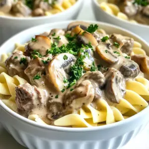 - 1 pound beef stew meat, cut into 1-inch cubes - 1 small onion, diced - 3 cloves garlic, minced - 8 ounces mushrooms, sliced - 2 cups beef broth For my Instant Pot Beef Stroganoff, I use beef stew meat. It cooks well and stays tender. I also dice a small onion. The onion adds great flavor. Next, I chop three cloves of garlic. Garlic gives a nice aroma and taste. I like to add eight ounces of sliced mushrooms. They make the dish earthy and rich. Finally, I use two cups of beef broth. This broth keeps everything moist and adds depth. - 1 tablespoon Worcestershire sauce - 1 teaspoon dried thyme - 1 teaspoon paprika - Salt and pepper, to taste - 2 tablespoons flour For seasoning, I add one tablespoon of Worcestershire sauce. It gives a savory kick. I mix in one teaspoon of dried thyme and paprika. Both herbs enhance the flavor profile. Don&rsquo;t forget salt and pepper to taste. Lastly, I use two tablespoons of flour. This helps thicken the sauce later. - 12 ounces egg noodles - 1 cup sour cream - Fresh parsley, chopped (for garnish) For serving, I love to use twelve ounces of egg noodles. They soak up all the yummy sauce. I stir in one cup of sour cream for creaminess. It makes the dish smooth and rich. To finish, I sprinkle fresh parsley on top. It adds color and a fresh touch. {{ingredient_image_1}} To start, set your Instant Pot to Saut&eacute; mode. Add a splash of oil and wait until it&rsquo;s hot. Then, add the beef stew meat in small batches. Brown each piece for about 3-4 minutes. This step adds a deep flavor to the dish. Once browned, remove the beef and set it aside on a plate. In the same pot, toss in the diced onion. Saut&eacute; the onion for about 2-3 minutes until it softens. Then, add the minced garlic and sliced mushrooms. Cook them together for about 5 minutes. You want the mushrooms to be tender. This step builds a great base for your stroganoff. Next, it&rsquo;s time to add liquids. Pour in the beef broth and Worcestershire sauce. Sprinkle in the dried thyme and paprika. Don't forget to add salt and pepper to taste. Use a wooden spoon to scrape the bottom of the pot. This process is called deglazing. It helps lift all those tasty bits stuck to the pot. Now, add the browned beef back into the pot. Close the lid and make sure the valve is set to sealing. Cook on high pressure for 20 minutes. After this, you&rsquo;ll add the egg noodles. Carefully release the pressure by turning the valve to venting. Stir in the noodles, close the lid, and cook on high pressure for another 5 minutes. Once the noodles are cooked, do a quick release of the pressure. In a small bowl, mix the flour with the sour cream. Make sure there are no lumps. Stir this mixture into the beef and noodles in the pot. This will create a creamy texture. If the sauce needs thickening, simmer it on Saut&eacute; for 2-3 minutes. Now, it&rsquo;s time to serve! Spoon the beef stroganoff into bowls. For a nice touch, garnish each bowl with freshly chopped parsley. This adds both color and flavor. Enjoy your meal and share it with family or friends! For best results, choose beef stew meat. This cut has the right fat and flavor. Cut it into 1-inch cubes for even cooking. Searing the beef adds deep flavor. Cook it in batches to avoid steaming. If you want extra tender beef, cook it a bit longer. Try 25 minutes under high pressure. You can change the flavor with different seasonings. Try adding garlic powder or onion powder. For a kick, use a dash of cayenne pepper. You can also add vegetables like carrots or peas. If you want a protein change, try chicken or mushrooms for a vegetarian option. Caring for your Instant Pot is easy. Always clean the lid and sealing ring after use. Use warm, soapy water for the pot and accessories. If you face issues, check for blockages in the vent. Make sure the sealing ring is fitted properly for best results. Pro Tips Choose the Right Cut: Using beef stew meat ensures a tender result as it becomes more flavorful and soft when pressure cooked. Deglazing is Key: Scraping the bottom of the pot after saut&eacute;ing helps incorporate all the delicious browned bits into your sauce. Perfect Noodle Texture: For best results, add the noodles after the beef is cooked to ensure they don't overcook and become mushy. Thickening the Sauce: Mixing flour with sour cream before adding it to the pot prevents lumps and helps create a smooth, creamy sauce. {{image_2}} You can easily swap beef for chicken in this dish. Chicken stroganoff is light and tasty. Just use chicken breast or thighs, cut into pieces. Cook the chicken the same way as beef. It will still be rich and creamy! For those who want a meat-free meal, try a vegetarian option. Replace the beef with hearty mushrooms or lentils. You can use a mix of vegetables like bell peppers, zucchini, or carrots. This option is packed with flavor and nutrients! Mushrooms add a deep, earthy flavor to stroganoff. You can try different types for unique tastes. Cremini mushrooms offer a robust flavor, while shiitake mushrooms add a hint of smokiness. Even portobello mushrooms can work well in this dish. Adding other vegetables can boost the nutrition. Consider adding spinach or peas for color and texture. They cook quickly, so add them just before serving. It makes the dish more colorful and healthy. If you need a gluten-free option, you can use cornstarch or a gluten-free flour blend as a thickener. Just mix it with a little water before adding to the sauce. This keeps your stroganoff thick and creamy without gluten. For dairy-free needs, you can substitute sour cream with cashew cream or coconut yogurt. These options maintain creaminess and flavor. They make the dish suitable for dairy-free diets. Enjoy your meal without missing out on taste! To keep your beef stroganoff fresh, store it in the fridge. First, let it cool down to room temperature. Then, use an airtight container. This will help keep the dish tasty for up to three days. When it's time to enjoy leftovers, you can reheat them easily. For the stovetop, place the stroganoff in a pan. Heat it on low and stir often. This helps maintain its creamy texture. If you prefer the microwave, use a microwave-safe bowl. Heat in short bursts, stirring in between to keep it smooth. You can freeze beef stroganoff for longer storage. To do this, freeze it before or after cooking. If freezing before cooking, combine all ingredients in a freezer bag. If freezing after, let it cool fully before placing it in a container. For best results, thaw in the fridge overnight before reheating. This ensures even heating and keeps the flavors intact. Instant Pot Beef Stroganoff can last about 3 to 4 days in the fridge. To store it safely, place it in an airtight container. Make sure it cools down first before sealing. Always check for any signs of spoilage before eating leftovers. If it smells off or looks strange, throw it away. Yes, you can make the beef stroganoff sauce ahead of time. Cook the beef and sauce as directed, then cool it down. Store it in the fridge for up to 3 days. When you are ready to eat, reheat it on low heat. Add the sour cream right before serving for the best taste. Beef stroganoff pairs well with a few sides. Here are some ideas: - Egg noodles - Rice - Mashed potatoes - Steamed vegetables - A simple green salad These options complement the rich flavors of the beef stroganoff. Yes, you can make beef stroganoff without an Instant Pot. Use a large pot or a slow cooker instead. Saut&eacute; the beef and vegetables in the pot. Then, add the liquids and let it simmer until the beef is tender. For a slow cooker, cook on low for 6-8 hours or high for 3-4 hours. Add noodles and sour cream at the end. In this post, we covered how to make Instant Pot Beef Stroganoff. We explored the main ingredients, including beef stew meat, onions, garlic, and mushrooms. I shared step-by-step instructions for cooking and thickening the sauce. We discussed tips for tender beef and ways to customize flavors. Finally, I offered storage and reheating methods for leftovers. This dish is easy and delicious, perfect for busy days. Enjoy creating your own beef stroganoff and make it your favorite meal!