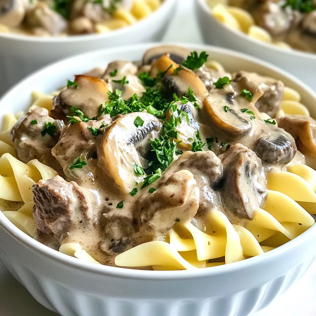 - 1 pound beef stew meat, cut into 1-inch cubes - 1 small onion, diced - 3 cloves garlic, minced - 8 ounces mushrooms, sliced - 2 cups beef broth For my Instant Pot Beef Stroganoff, I use beef stew meat. It cooks well and stays tender. I also dice a small onion. The onion adds great flavor. Next, I chop three cloves of garlic. Garlic gives a nice aroma and taste. I like to add eight ounces of sliced mushrooms. They make the dish earthy and rich. Finally, I use two cups of beef broth. This broth keeps everything moist and adds depth. - 1 tablespoon Worcestershire sauce - 1 teaspoon dried thyme - 1 teaspoon paprika - Salt and pepper, to taste - 2 tablespoons flour For seasoning, I add one tablespoon of Worcestershire sauce. It gives a savory kick. I mix in one teaspoon of dried thyme and paprika. Both herbs enhance the flavor profile. Don’t forget salt and pepper to taste. Lastly, I use two tablespoons of flour. This helps thicken the sauce later. - 12 ounces egg noodles - 1 cup sour cream - Fresh parsley, chopped (for garnish) For serving, I love to use twelve ounces of egg noodles. They soak up all the yummy sauce. I stir in one cup of sour cream for creaminess. It makes the dish smooth and rich. To finish, I sprinkle fresh parsley on top. It adds color and a fresh touch. {{ingredient_image_1}} To start, set your Instant Pot to Sauté mode. Add a splash of oil and wait until it’s hot. Then, add the beef stew meat in small batches. Brown each piece for about 3-4 minutes. This step adds a deep flavor to the dish. Once browned, remove the beef and set it aside on a plate. In the same pot, toss in the diced onion. Sauté the onion for about 2-3 minutes until it softens. Then, add the minced garlic and sliced mushrooms. Cook them together for about 5 minutes. You want the mushrooms to be tender. This step builds a great base for your stroganoff. Next, it’s time to add liquids. Pour in the beef broth and Worcestershire sauce. Sprinkle in the dried thyme and paprika. Don't forget to add salt and pepper to taste. Use a wooden spoon to scrape the bottom of the pot. This process is called deglazing. It helps lift all those tasty bits stuck to the pot. Now, add the browned beef back into the pot. Close the lid and make sure the valve is set to sealing. Cook on high pressure for 20 minutes. After this, you’ll add the egg noodles. Carefully release the pressure by turning the valve to venting. Stir in the noodles, close the lid, and cook on high pressure for another 5 minutes. Once the noodles are cooked, do a quick release of the pressure. In a small bowl, mix the flour with the sour cream. Make sure there are no lumps. Stir this mixture into the beef and noodles in the pot. This will create a creamy texture. If the sauce needs thickening, simmer it on Sauté for 2-3 minutes. Now, it’s time to serve! Spoon the beef stroganoff into bowls. For a nice touch, garnish each bowl with freshly chopped parsley. This adds both color and flavor. Enjoy your meal and share it with family or friends! For best results, choose beef stew meat. This cut has the right fat and flavor. Cut it into 1-inch cubes for even cooking. Searing the beef adds deep flavor. Cook it in batches to avoid steaming. If you want extra tender beef, cook it a bit longer. Try 25 minutes under high pressure. You can change the flavor with different seasonings. Try adding garlic powder or onion powder. For a kick, use a dash of cayenne pepper. You can also add vegetables like carrots or peas. If you want a protein change, try chicken or mushrooms for a vegetarian option. Caring for your Instant Pot is easy. Always clean the lid and sealing ring after use. Use warm, soapy water for the pot and accessories. If you face issues, check for blockages in the vent. Make sure the sealing ring is fitted properly for best results. Pro Tips Choose the Right Cut: Using beef stew meat ensures a tender result as it becomes more flavorful and soft when pressure cooked. Deglazing is Key: Scraping the bottom of the pot after sautéing helps incorporate all the delicious browned bits into your sauce. Perfect Noodle Texture: For best results, add the noodles after the beef is cooked to ensure they don't overcook and become mushy. Thickening the Sauce: Mixing flour with sour cream before adding it to the pot prevents lumps and helps create a smooth, creamy sauce. {{image_2}} You can easily swap beef for chicken in this dish. Chicken stroganoff is light and tasty. Just use chicken breast or thighs, cut into pieces. Cook the chicken the same way as beef. It will still be rich and creamy! For those who want a meat-free meal, try a vegetarian option. Replace the beef with hearty mushrooms or lentils. You can use a mix of vegetables like bell peppers, zucchini, or carrots. This option is packed with flavor and nutrients! Mushrooms add a deep, earthy flavor to stroganoff. You can try different types for unique tastes. Cremini mushrooms offer a robust flavor, while shiitake mushrooms add a hint of smokiness. Even portobello mushrooms can work well in this dish. Adding other vegetables can boost the nutrition. Consider adding spinach or peas for color and texture. They cook quickly, so add them just before serving. It makes the dish more colorful and healthy. If you need a gluten-free option, you can use cornstarch or a gluten-free flour blend as a thickener. Just mix it with a little water before adding to the sauce. This keeps your stroganoff thick and creamy without gluten. For dairy-free needs, you can substitute sour cream with cashew cream or coconut yogurt. These options maintain creaminess and flavor. They make the dish suitable for dairy-free diets. Enjoy your meal without missing out on taste! To keep your beef stroganoff fresh, store it in the fridge. First, let it cool down to room temperature. Then, use an airtight container. This will help keep the dish tasty for up to three days. When it's time to enjoy leftovers, you can reheat them easily. For the stovetop, place the stroganoff in a pan. Heat it on low and stir often. This helps maintain its creamy texture. If you prefer the microwave, use a microwave-safe bowl. Heat in short bursts, stirring in between to keep it smooth. You can freeze beef stroganoff for longer storage. To do this, freeze it before or after cooking. If freezing before cooking, combine all ingredients in a freezer bag. If freezing after, let it cool fully before placing it in a container. For best results, thaw in the fridge overnight before reheating. This ensures even heating and keeps the flavors intact. Instant Pot Beef Stroganoff can last about 3 to 4 days in the fridge. To store it safely, place it in an airtight container. Make sure it cools down first before sealing. Always check for any signs of spoilage before eating leftovers. If it smells off or looks strange, throw it away. Yes, you can make the beef stroganoff sauce ahead of time. Cook the beef and sauce as directed, then cool it down. Store it in the fridge for up to 3 days. When you are ready to eat, reheat it on low heat. Add the sour cream right before serving for the best taste. Beef stroganoff pairs well with a few sides. Here are some ideas: - Egg noodles - Rice - Mashed potatoes - Steamed vegetables - A simple green salad These options complement the rich flavors of the beef stroganoff. Yes, you can make beef stroganoff without an Instant Pot. Use a large pot or a slow cooker instead. Sauté the beef and vegetables in the pot. Then, add the liquids and let it simmer until the beef is tender. For a slow cooker, cook on low for 6-8 hours or high for 3-4 hours. Add noodles and sour cream at the end. In this post, we covered how to make Instant Pot Beef Stroganoff. We explored the main ingredients, including beef stew meat, onions, garlic, and mushrooms. I shared step-by-step instructions for cooking and thickening the sauce. We discussed tips for tender beef and ways to customize flavors. Finally, I offered storage and reheating methods for leftovers. This dish is easy and delicious, perfect for busy days. Enjoy creating your own beef stroganoff and make it your favorite meal!